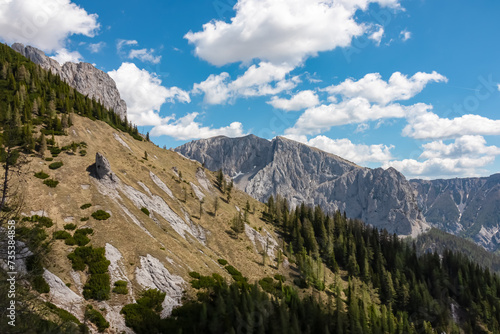 Panoramic view of majestic mountain peak Winkelkogel in untamed Hochschwab mountain range, Styria, Austria, Scenic hiking trail in remote Austrian Alps in summer. Escapism in wild nature. Wanderlust