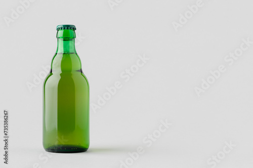 Green steinie beer bottle mockup with copyspace.