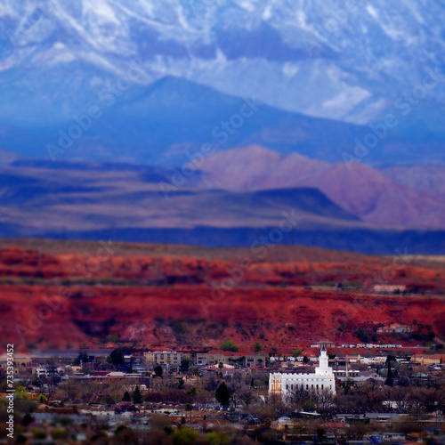 St. George Utah Valley with Mormon LDS Temple Red Cliffs and Snow Covered Mountains Miniature Blur