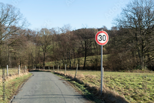 Traffic sign on a country road in the countryside in springtime