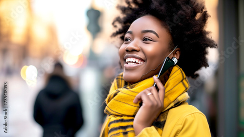 African American young woman talking on cell phone. photo