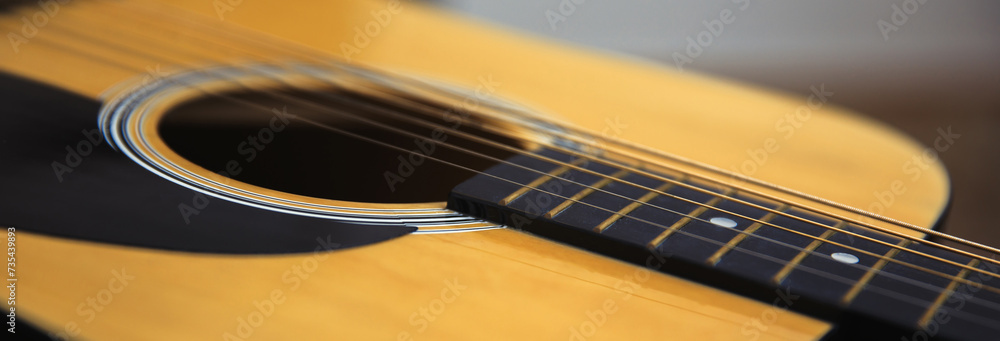 Obraz premium acoustic guitar in table