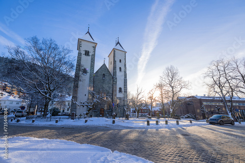 Early morning at Mariakyrken in Bergen, Norway, or Mary's church. Beautiful winter morning in scandinavia, visible small square in front of the church.
