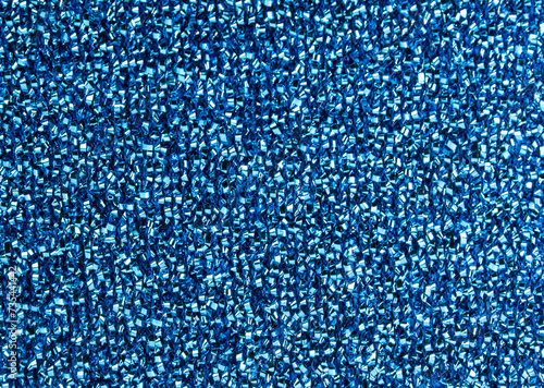 dish sponge close-up. blue background.