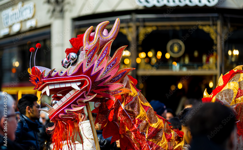 Dragon dance during Chinese lunar year celebrations in London, England