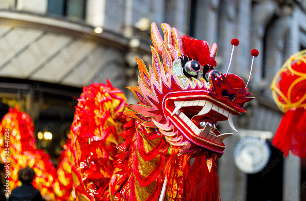 Fototapeta premium Dragon dance during Chinese lunar year celebrations in London, England