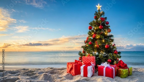 christmas tree and gifts on the sandy beach