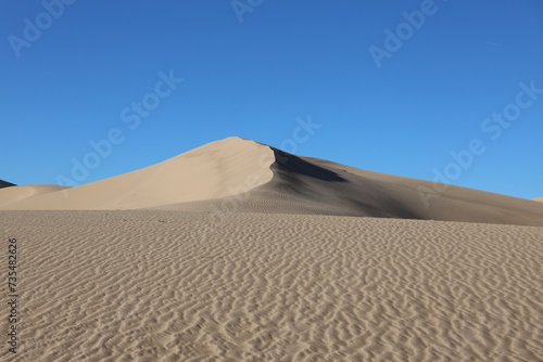 sand dunes in a remote desert oasis