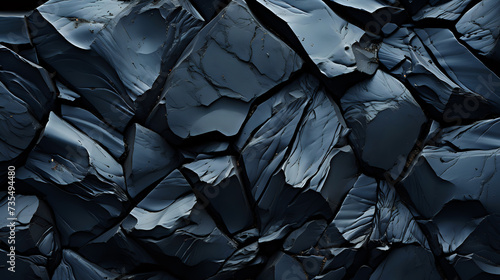 Dark Geometric Textures with Deep Blue Hues This close-up captures the essence of dark, jagged geometric shapes, creating a textured surface with deep blue and black tones perfect for ab