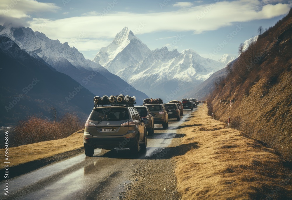 Car Convoy Amidst Majestic Mountains Car Convoy Amidst Majestic Mountains