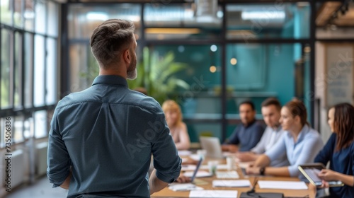 Workshop or Training Session: A QA expert leading a workshop or training session for a group of professionals.