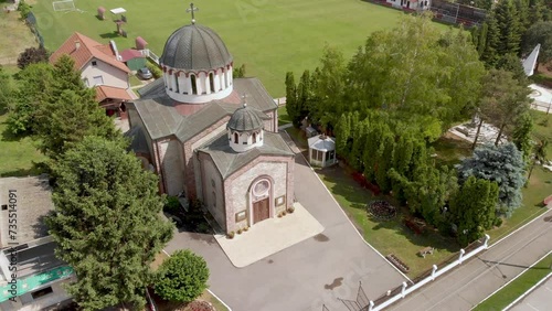 Aerial View of Ortodox Church in Town of Temerin on beautiful sunny day photo