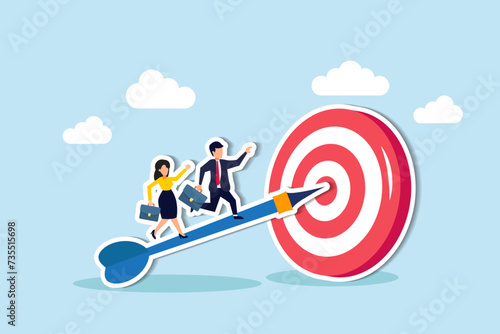 Business success, goals achieved, career growth concept, confidence businessman and businesswoman working team running up archer arrow which hitting bullseye target.