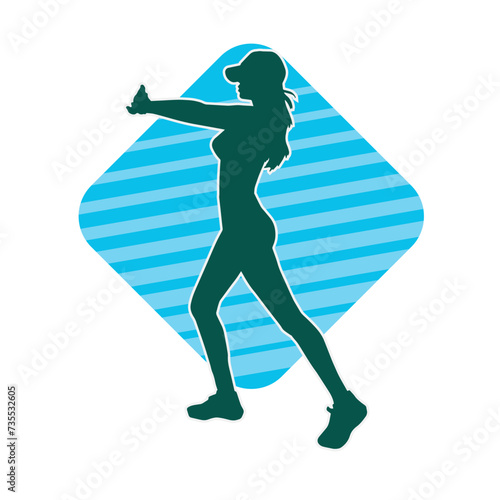Silhouette of slim female doing exercise. Silhouette of a sporty woman doing gym workout pose. 