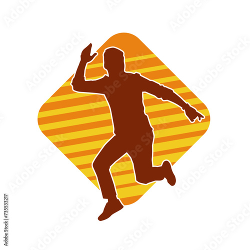 Silhouette of a man in dancing pose. Silhouette of a male dancer in performing pose.