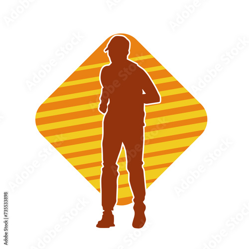 Silhouette of a sporty man doing jogging. Silhouette of a man in pose of healthy running.
