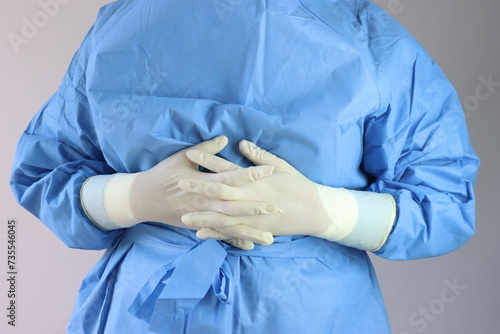фотографія Health care professional with sterile surgical clothes and sterile gloves