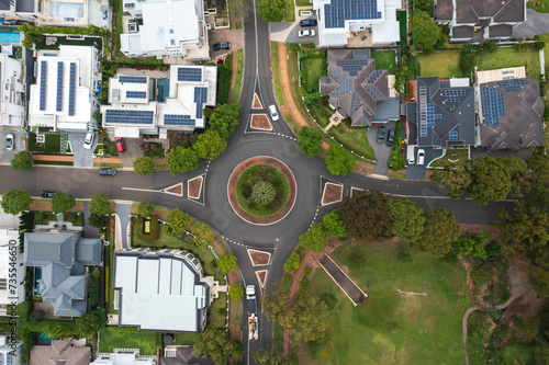 Aerial view of street roundabout with modern prestige houses in suburban Sydney, Australia