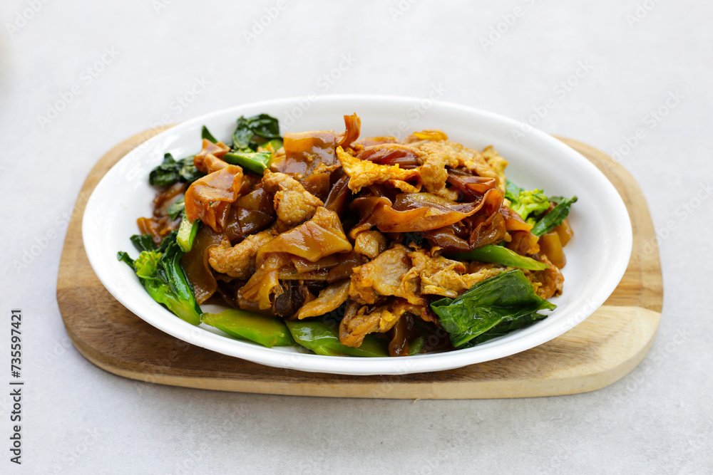 Stir-fried rice noodles with soy sauce and pork Stir-fried rice noodles with soy sauce and pork