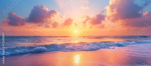 Spectacular ocean sunset, majestic wave crashing on the sandy beach