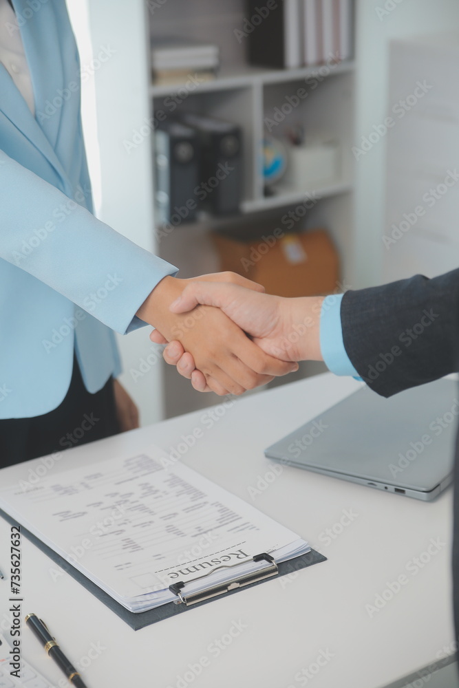 Close up view of job interview in office, focus on resume writing tips, employer reviewing good cv of prepared skilled applicant, recruiter considering application, hr manager making hiring decision Close up view of job interview in office, focus on resume writing tips, employer reviewing good cv of prepared skilled applicant, recruiter considering application, hr manager making hiring decision