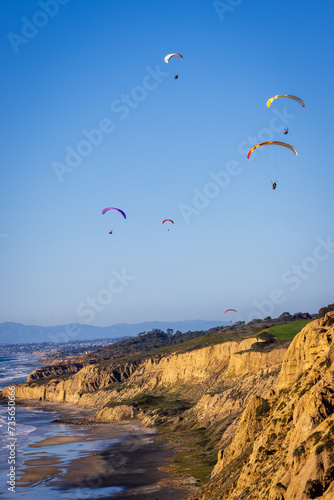 The black beach with paraglider