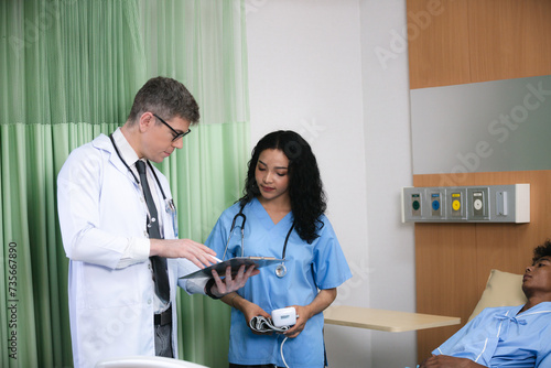 Professional male doctor in white medical uniform talk discuss results or symptoms with female patient, man GP or physician consult client give recommendation at meeting in hospital, health insurance