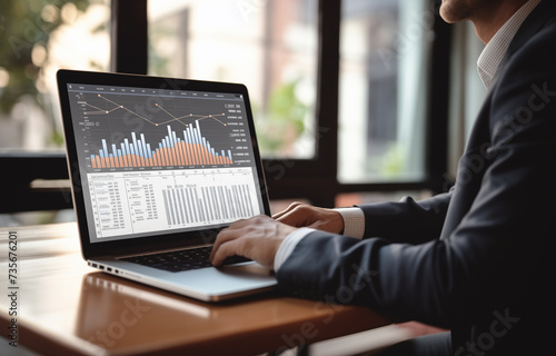 businessman using laptop and a laptop screen showing a business graph, in the style of bauhaus functional design, ethereal trees, oshare kei, selective focus, group material, screen format, blueprint 