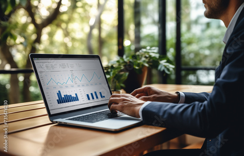 businessman using laptop and a laptop screen showing a business graph, in the style of bauhaus functional design, ethereal trees, oshare kei, selective focus, group material, screen format, blueprint 