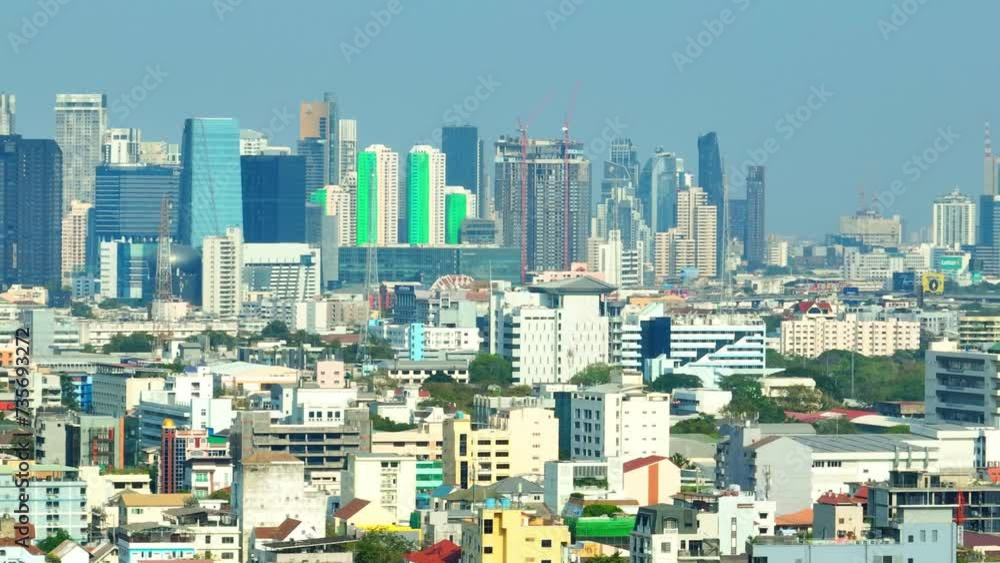 4K - Bangkok Thailand: Drone Aerial view, Hovering high, the drone surveys the urban sprawl below, revealing the dynamic energy of the bustling business district. Global travel concept.
4K - Bangkok Thailand: Drone Aerial view, Hovering high, the drone surveys the urban sprawl below, revealing the dynamic energy of the bustling business district. Global travel concept.
