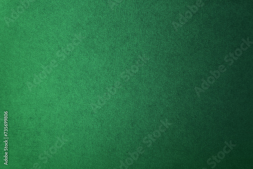 Deep dark green tone color paint on environmental friendly cardboard box blank paper texture background with space minimal style