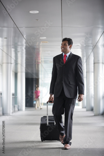 Indian business man in modern Asian city