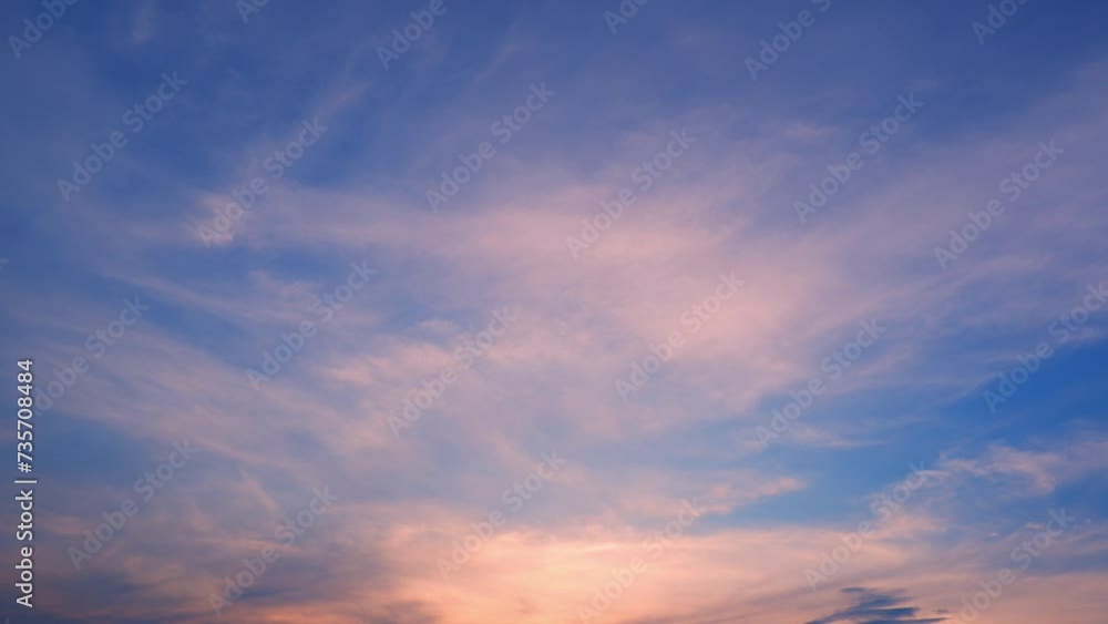 4K : Sunset sky time lapse : Timelapse video captures a sunset sky adorned with vibrant hues. Wispy clouds gracefully dance across the horizon, painting a picturesque scene of tranquility and beauty. 4K : Sunset sky time lapse : Timelapse video captures a sunset sky adorned with vibrant hues. Wispy clouds gracefully dance across the horizon, painting a picturesque scene of tranquility and beauty.