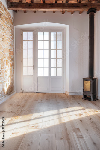 Empty room with bright light and a fireplace. Natural texture and minimalist interior design. © JuanM