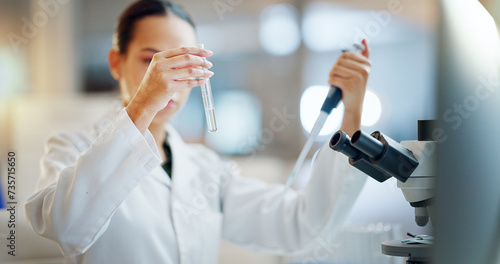 Science, results and woman with pipette, test tube and microscope for biotech solution in laboratory. Medical research, scientist or lab technician in study for healthcare, medicine or vaccine test. photo