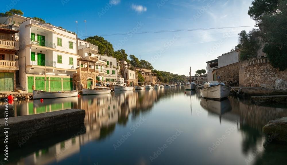 long exposure view of the picturesque village and harbor at Cala Figuera on Mallorca