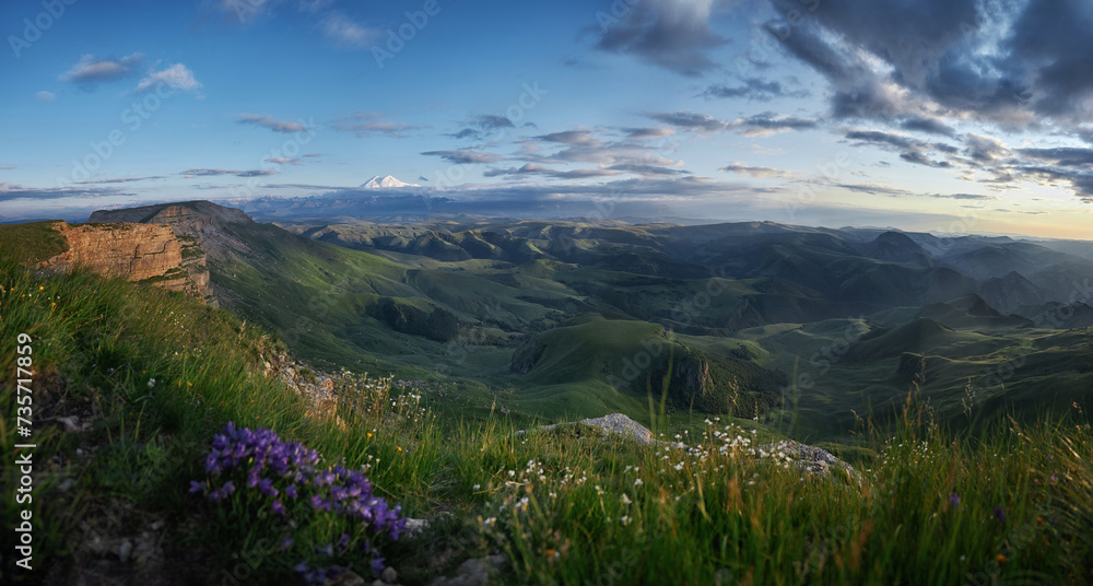 Caucasus mountains nature unveils its breathtaking beauty in every season. Vibrant wildflowers blooming in alpine meadows to majestic mountains towering against the azure sky