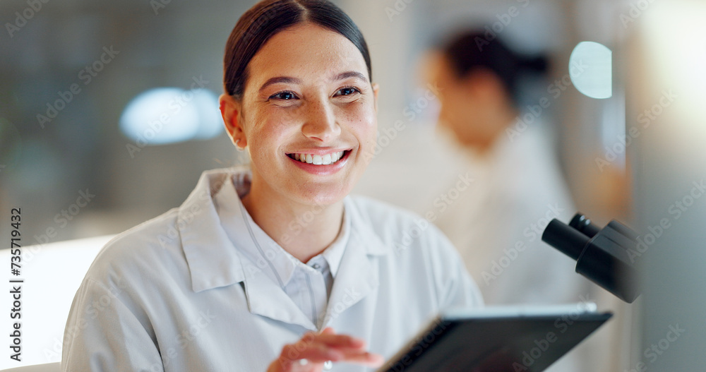 Scientist, woman and tablet, microscope or laboratory research for DNA analysis and happy with medical study. Student or science expert in biotechnology with digital software and lens check for data Scientist, woman and tablet, microscope or laboratory research for DNA analysis and happy with medical study. Student or science expert in biotechnology with digital software and lens check for data