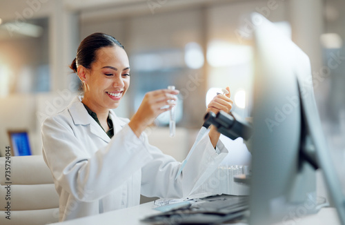 Science, research and happy woman with pipette, microscope and biotech solution in laboratory. Medical innovation, scientist or lab technician in study for healthcare, medicine check and vaccine test photo