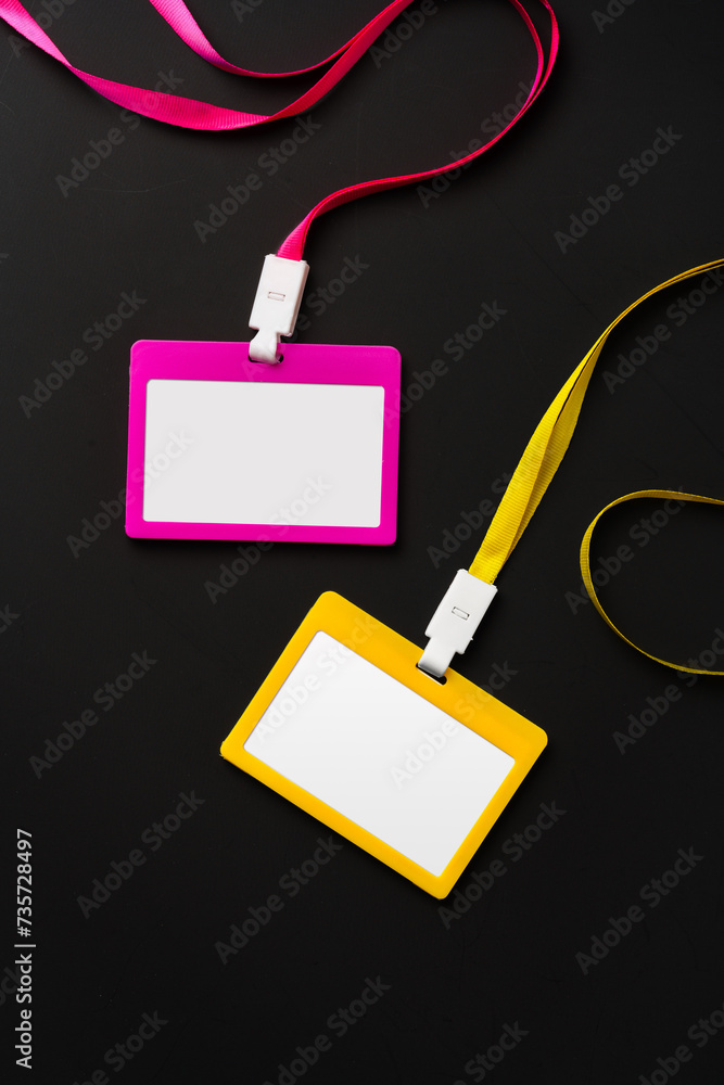 Blank badges on black background top view Blank badges on black background top view