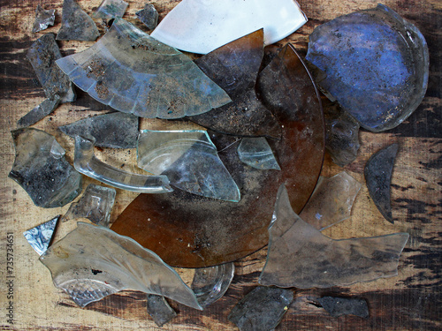 Top view of fragment of plates and bowls on the wooden board. 
