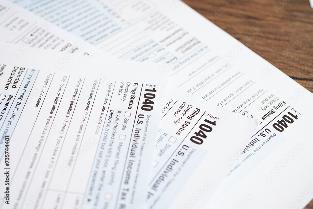 Tax form 1040 U.S. Individual Income Tax Return, business finance concept. Tax form 1040 U.S. Individual Income Tax Return, business finance concept.