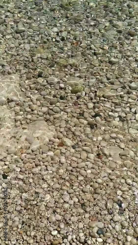 Sea waves splash against the stones. Rest as needed, relaxation, travel, nature ecology Sea waves splash against the stones. Rest as needed, relaxation, travel, nature ecology
