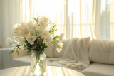 Beautiful delicate flowers in a vase on a table in a sunny room in White colours