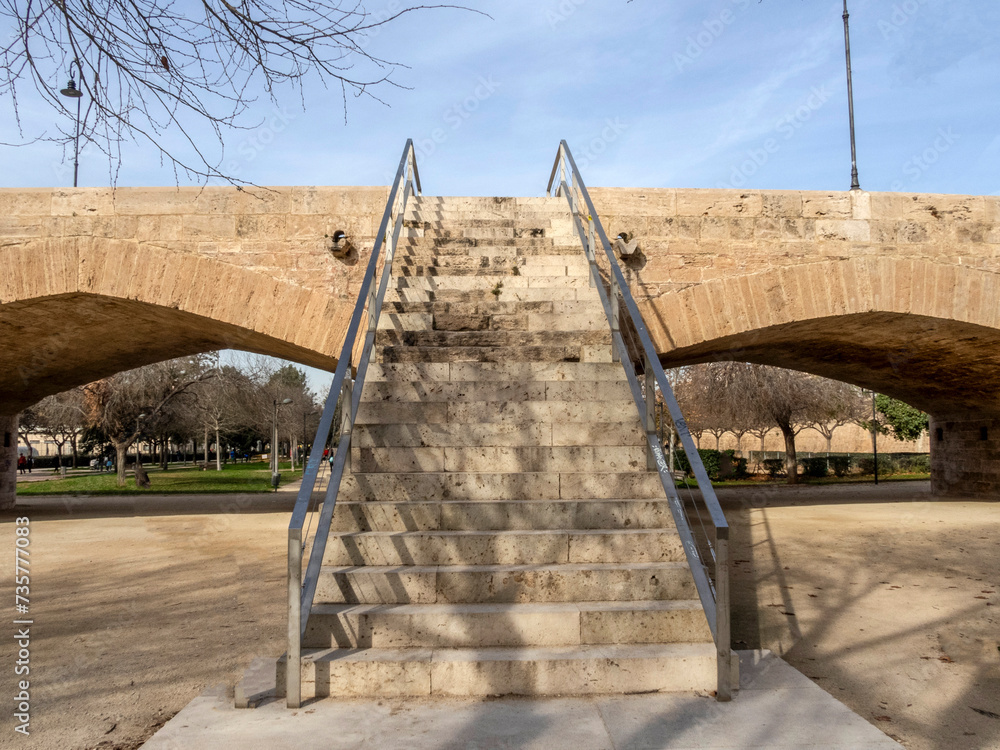 Original stairs of the Trinity Bridge (15th century). They gave access to the bank of the Turia River. Valencia, Spain.