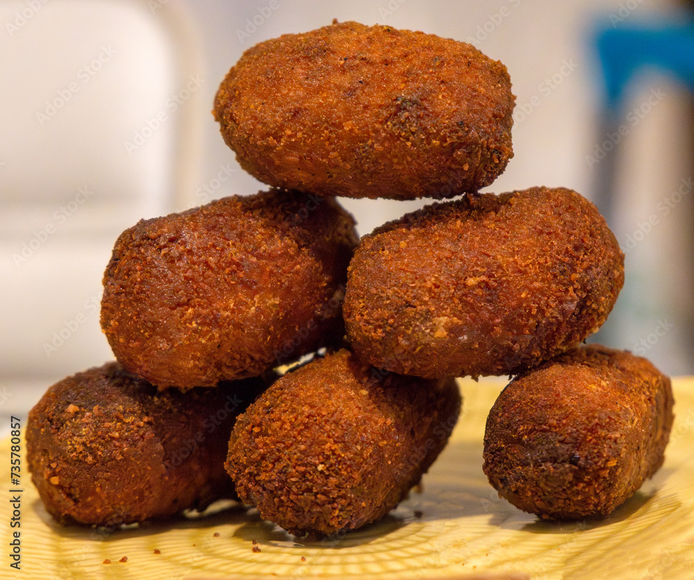 Croquettes plated in the shape of a pyramid. Galicia. Croquettes plated in the shape of a pyramid. Galicia.