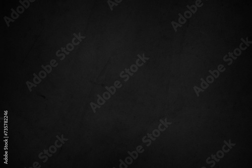Black dark concrete wall background. Pattern board cement texture grunge dirty scratched for show anthracite promote product urban floor and abstract paper design element decor. Blackboard blank.