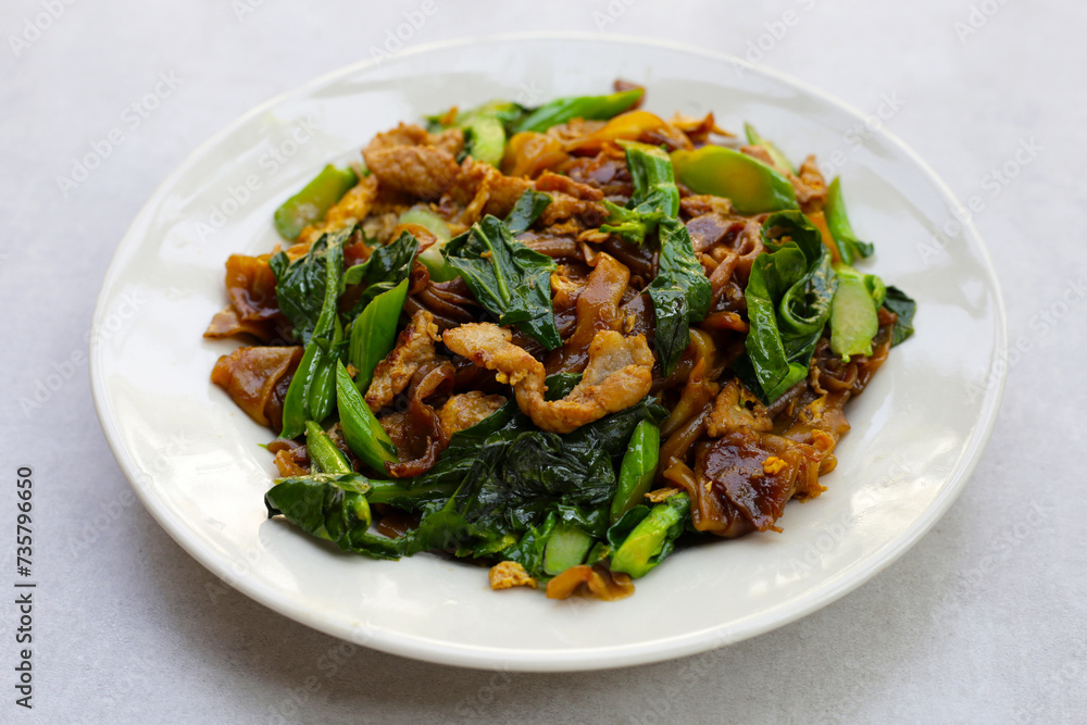 Stir-fried rice noodles with soy sauce and pork Stir-fried rice noodles with soy sauce and pork