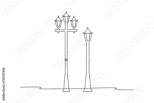 Night city street with decorative lights in city. Modern megalopolis district with multistorey houses glow with bright lights, snowflake lamps, Cartoon vector illustration