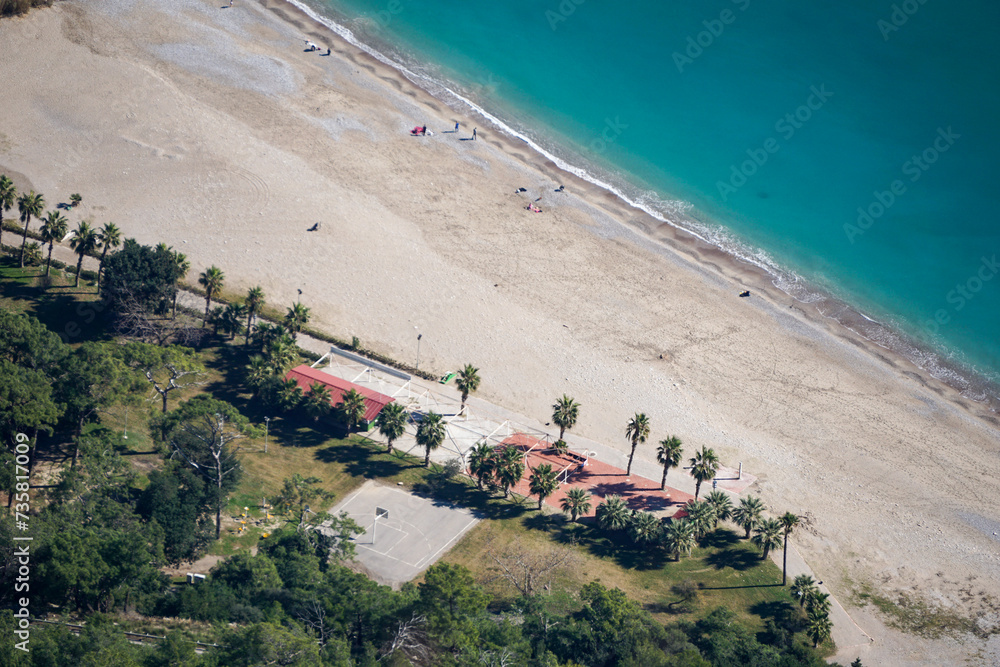 custom made wallpaper toronto digitalAerial drone view of the Sarisu beach in Antalya (Turkey) - coastline with palm trees, sand and basketball playground - tropical vacation resort